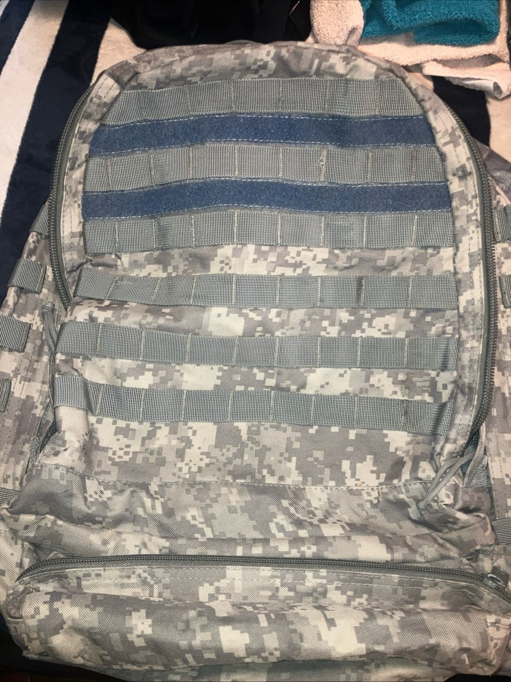 Tactical back pack with modern style camo , 7 pocket zipped closure great shape